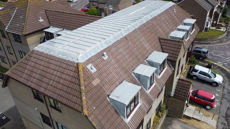 Team effort and drone imagery finally resolve leaky roof image