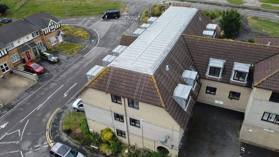 Team effort and drone imagery finally resolve leaky roof image